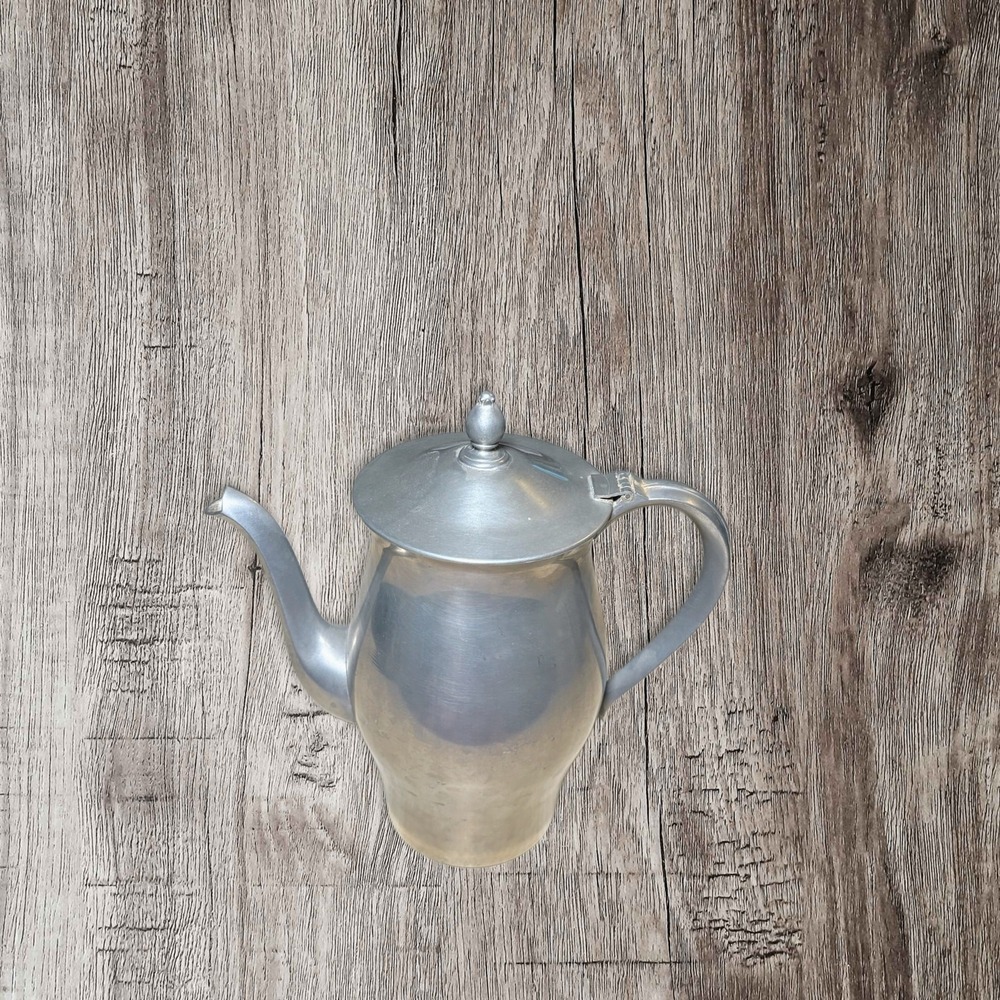 Vintage pewter teapot with hinged lid